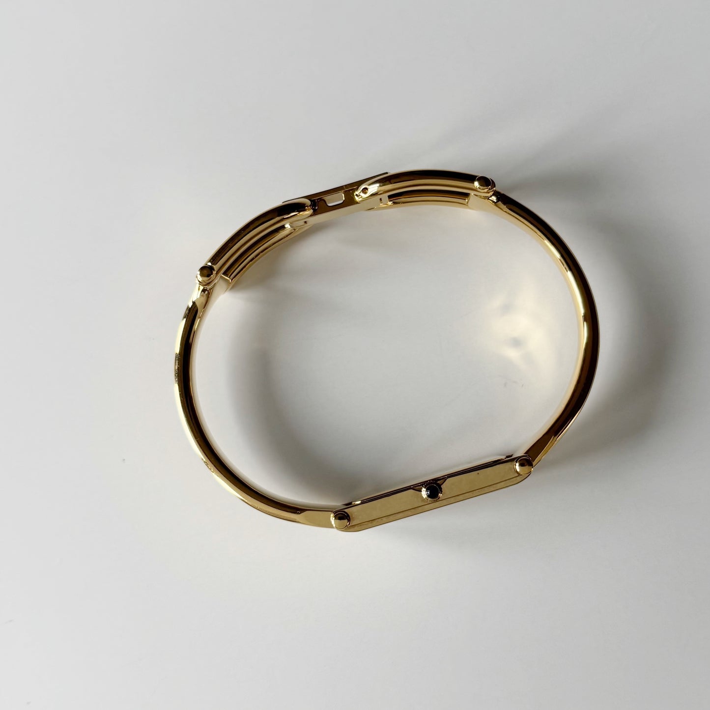 Gucci 1990s Gold Rectangular Dial Gold Plated Bangle Watch