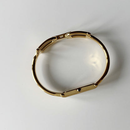 Gucci 1990s Gold Rectangular Dial Gold Plated Bangle Watch