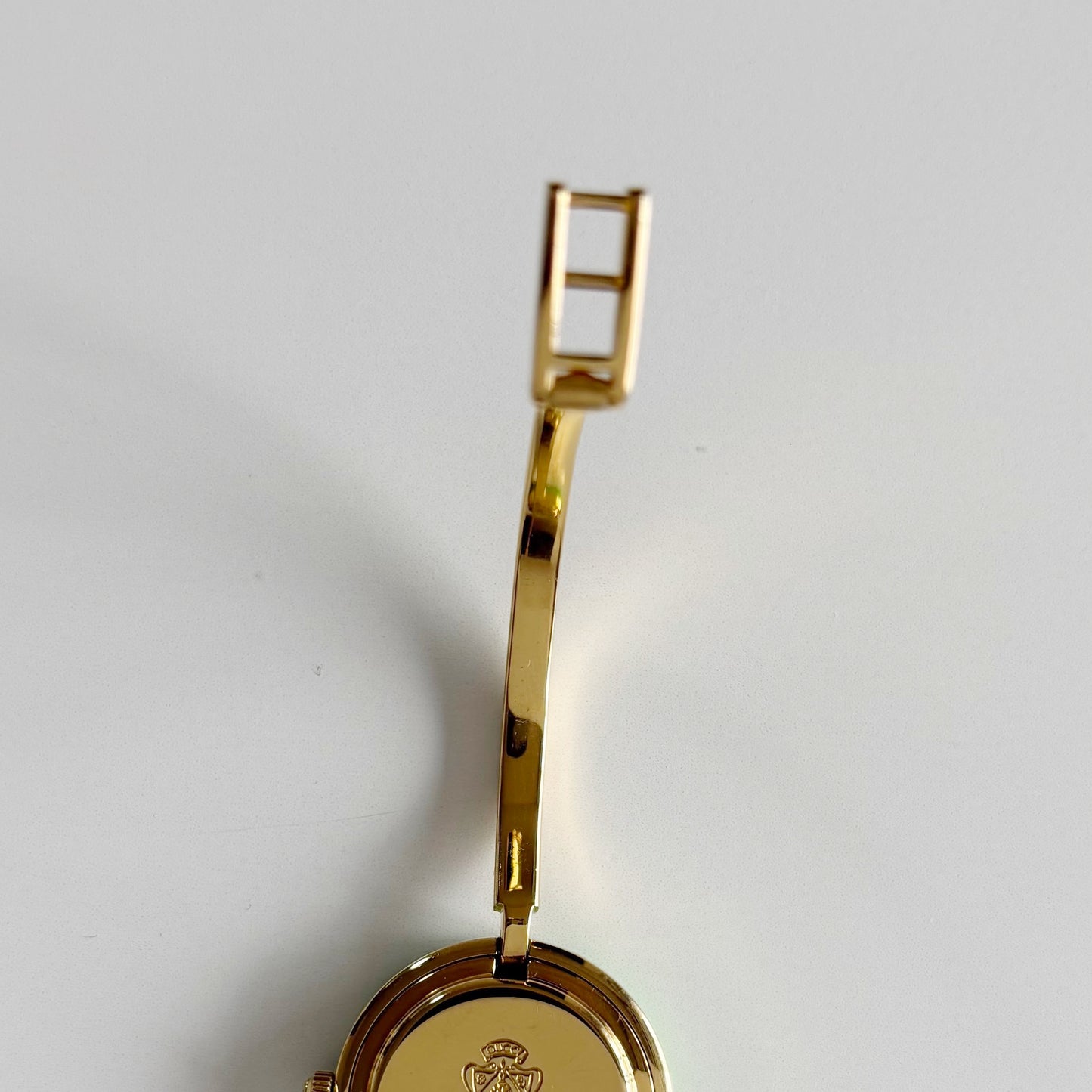 Gucci 1990sInterchangeable Bezel Gold Plated Bangle Watch with 12 bezels, case