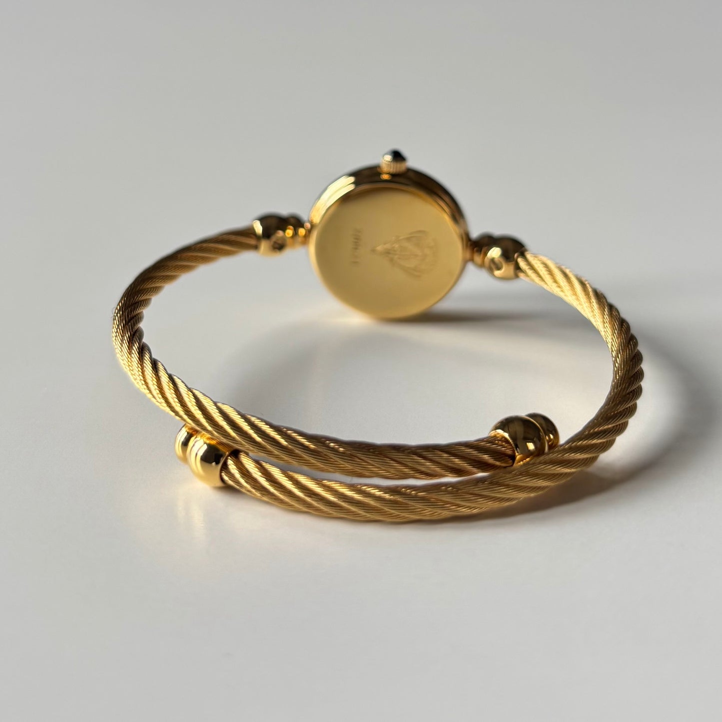Gucci 1990s Seashell Dial Gold Plated Cable Bangle Watch