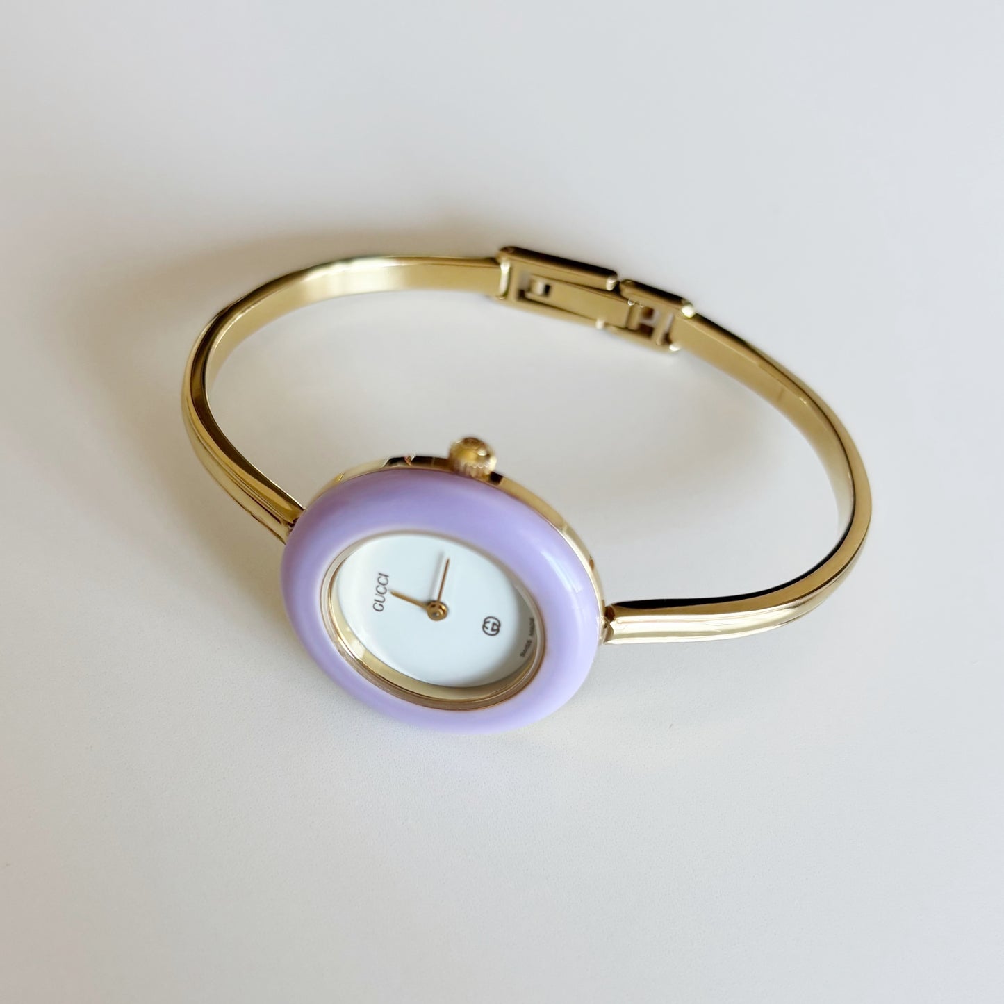 Gucci 1990s Interchangeable Bezel Gold Plated Bangle Watch with 12 bezels, case
