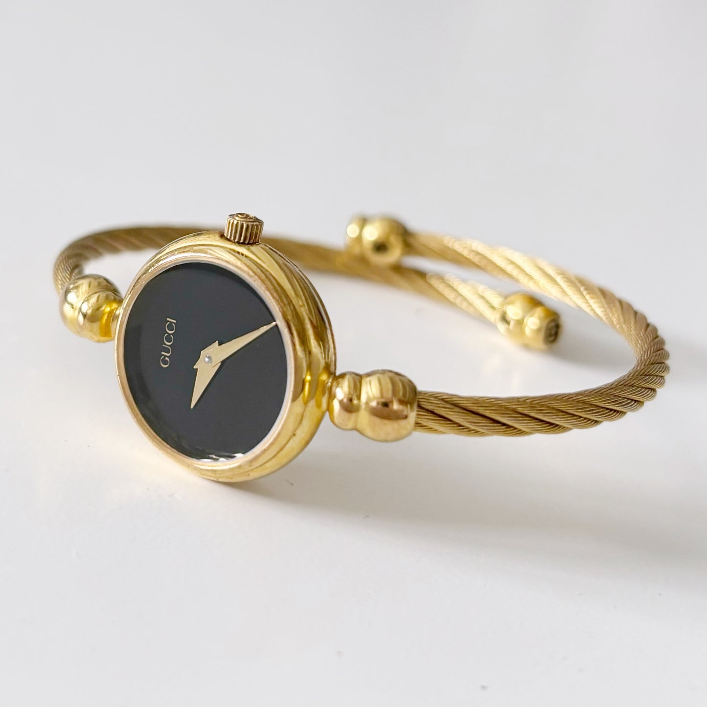 Gucci 1990s Black Dial Gold Plated Bangle Watch