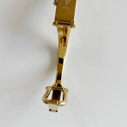 Gucci 1980s Rectangular Gold Dial Gold Plated Bangle Watch