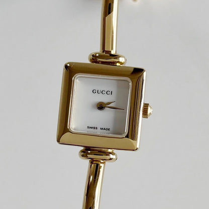 Gucci 1990s Square Dial Gold Plated Bangle Watch
