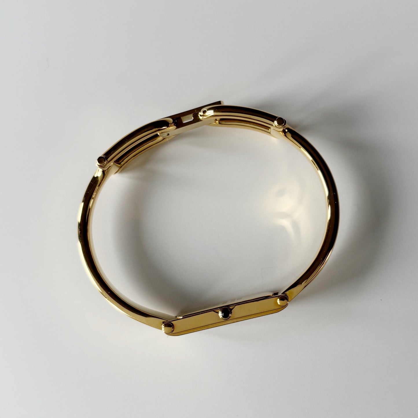 Gucci 1990s Seashell Rectangular Dial Gold Plated Bangle Watch