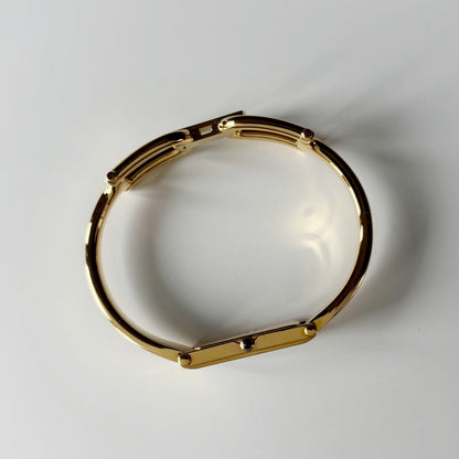Gucci 1990s Seashell Rectangular Dial Gold Plated Bangle Watch
