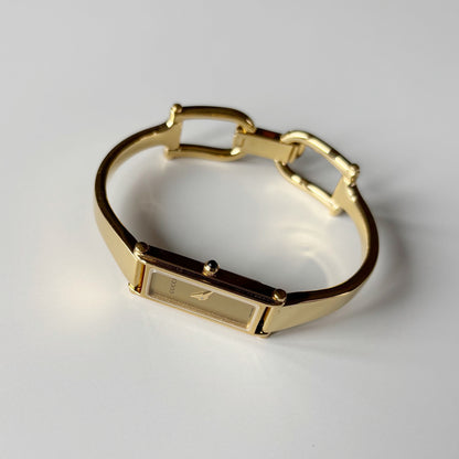 Gucci 1990s Gold Rectangular Dial Gold Plated Bangle Watch