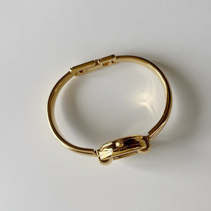 Gucci Round Dial Gold-Plated Bangle Watch