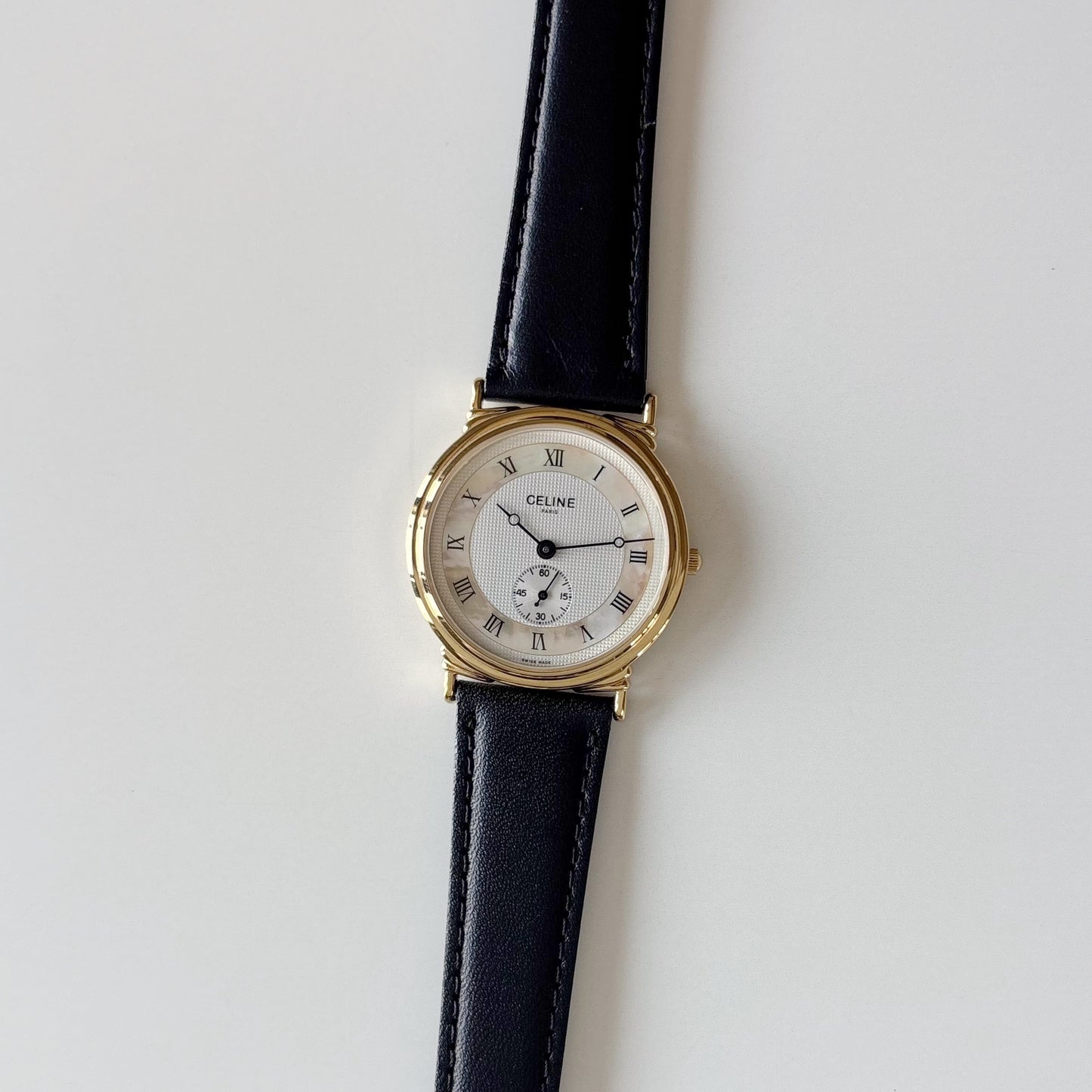Celine 1990s Seashell Round Dial Gold Plated Watch (Large)