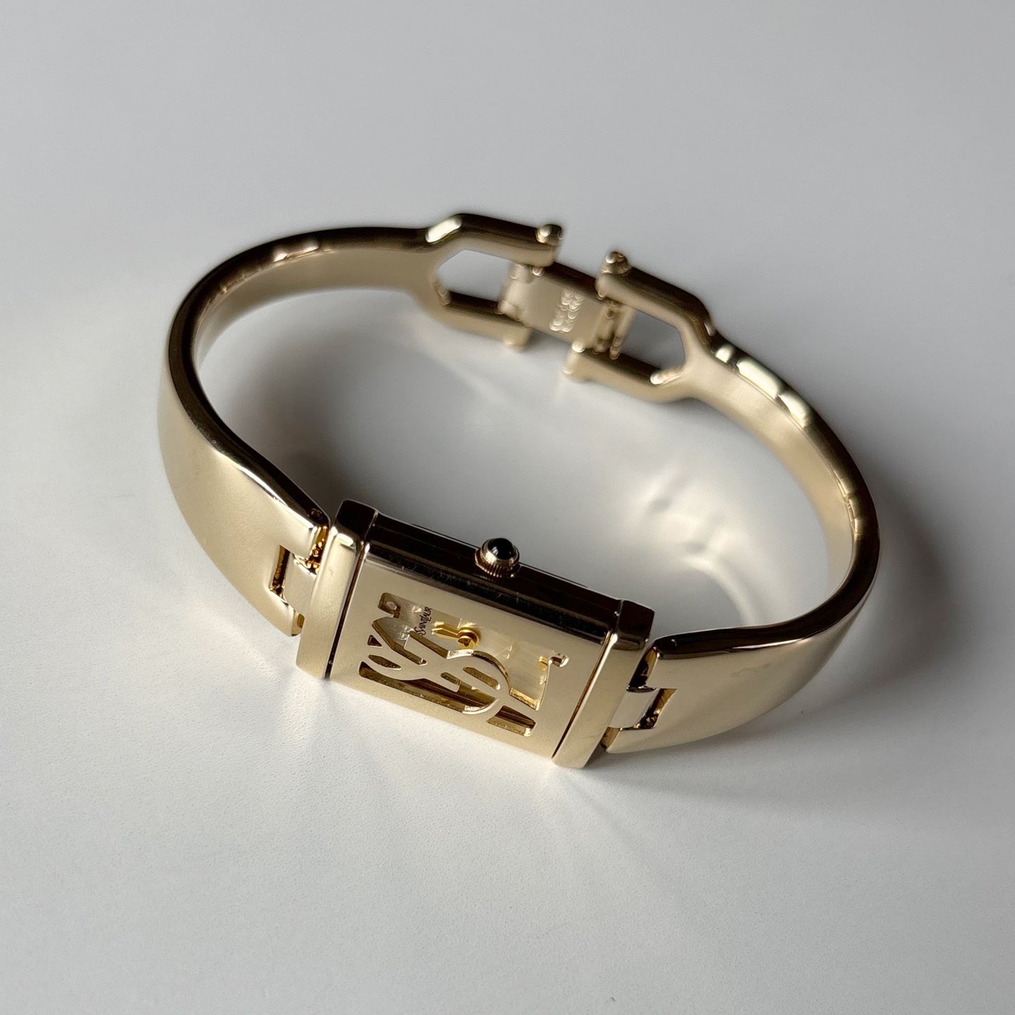 Yves Saint Laurent 1990s Peek-A-Boo Gold Plated Bangle Watch