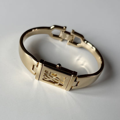 Yves Saint Laurent 1990s Peek-A-Boo Gold Plated Bangle Watch