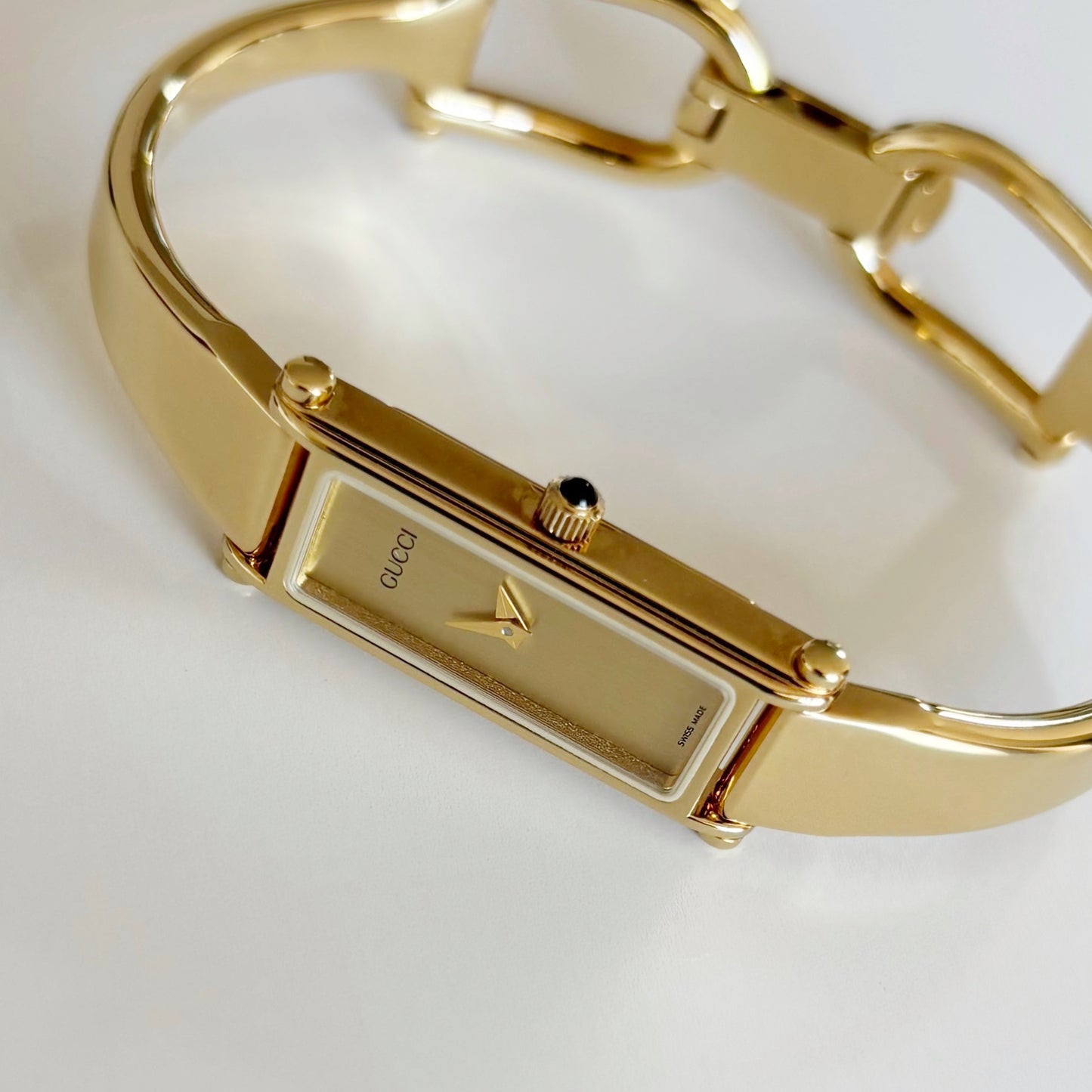 Gucci 1990s Rectangular Dial Gold Plated Bangle Watch