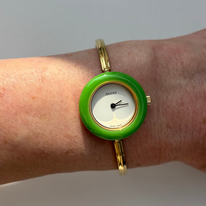 Gucci 1990s Interchangeable Bezel Gold Plated Bangle Watch with 12 bezels, case