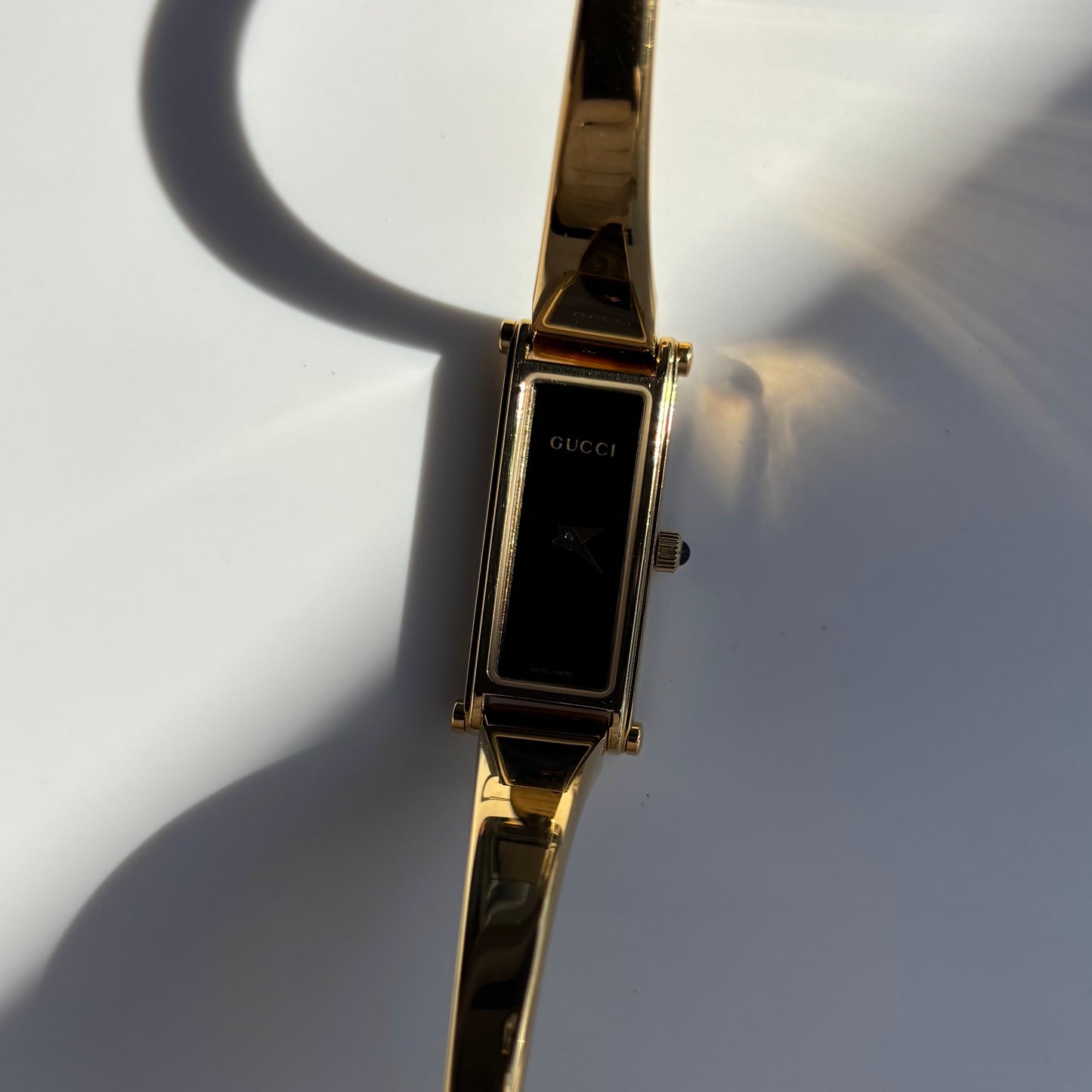 Gucci 1990s Black Dial Gold Plated Bangle Watch
