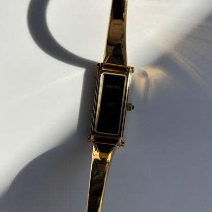 Gucci 1990s Black Dial Gold Plated Bangle Watch