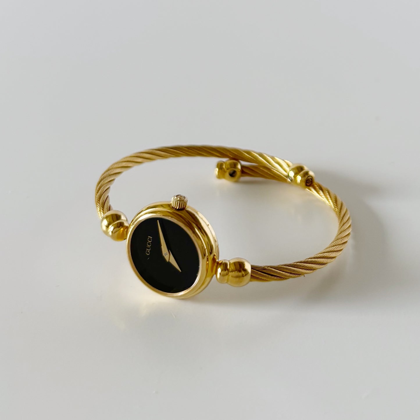 Gucci 1990s Black Dial Gold Plated Cable Bangle Watch