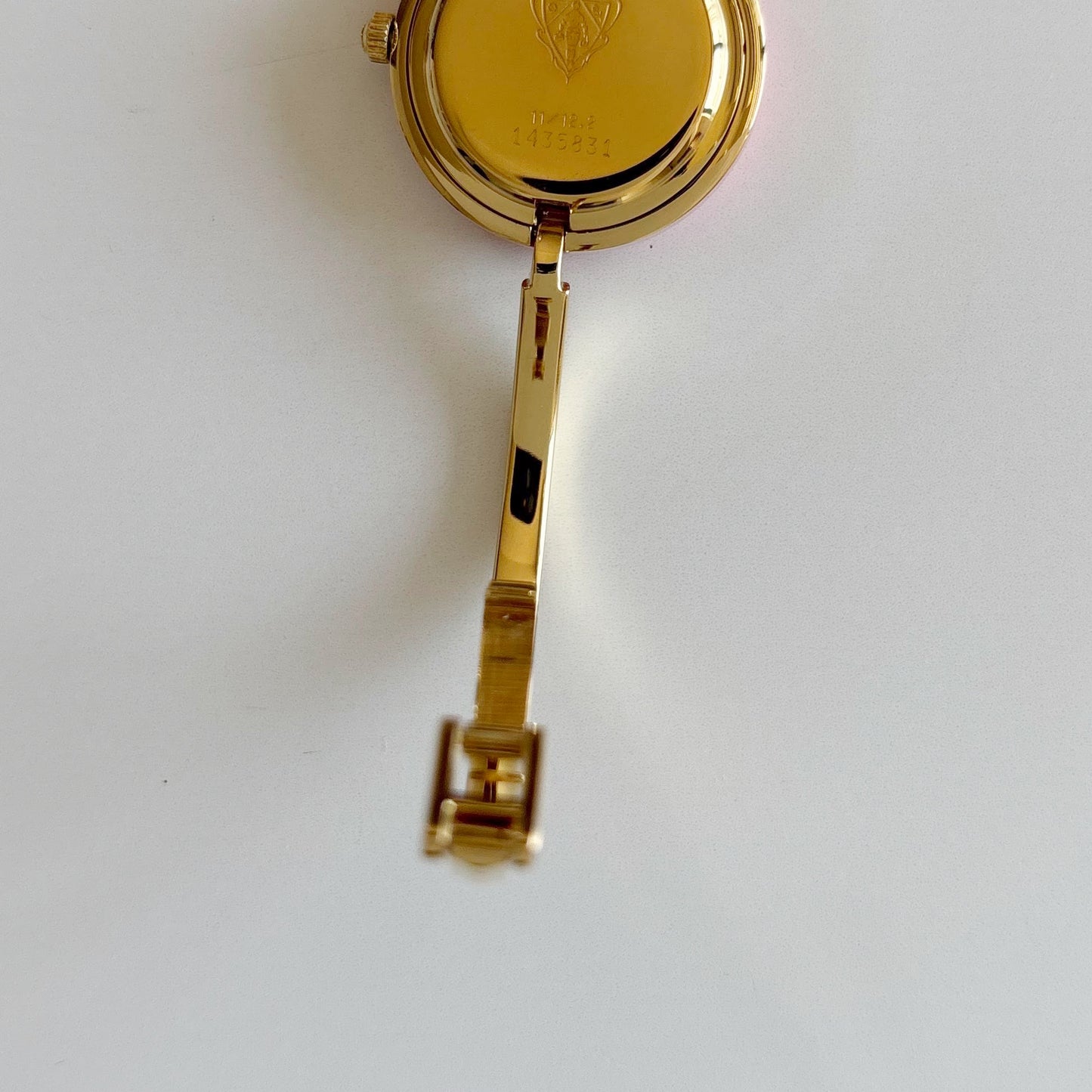 Gucci 1990s Interchangeable Bezel Gold Plated Bangle Watch with 12 bezels, case