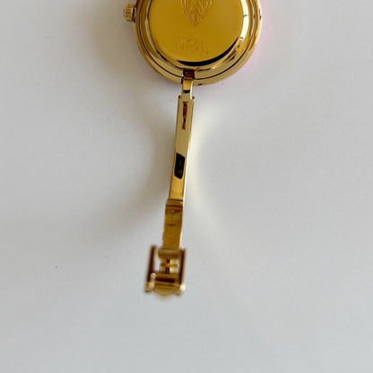 Gucci 1990s Interchangeable Bezel Gold Plated Bangle Watch with 12 bezels, case