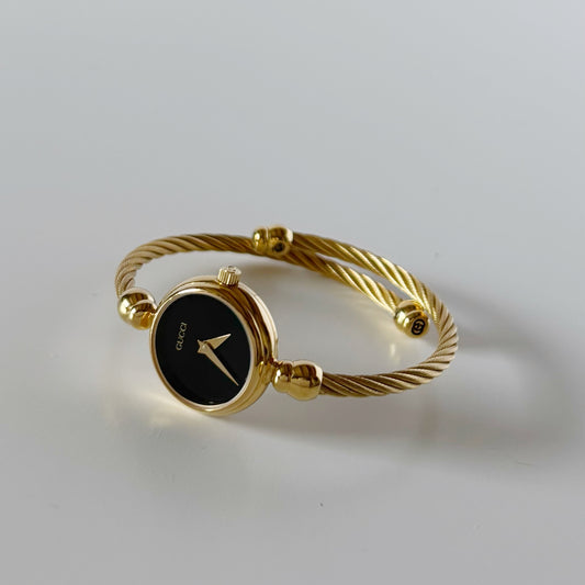 Gucci 1990s Black Dial Gold Plated Cable Bangle Watch