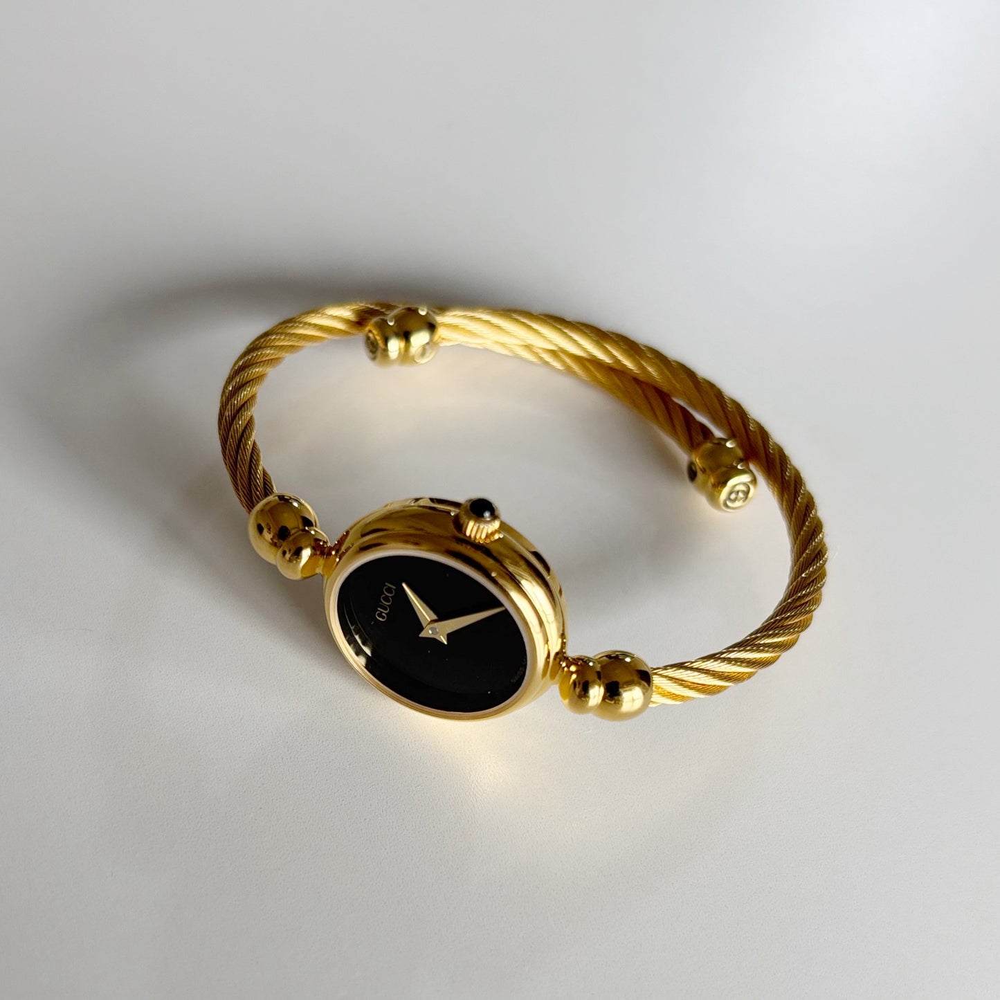 Gucci 1990s Black Dial Gold Plated Cable Band Bangle Watch