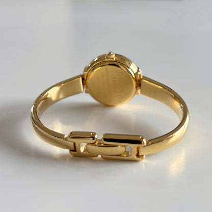 Gucci 1990s Round Dial Gold Plated Bangle Watch (Small)