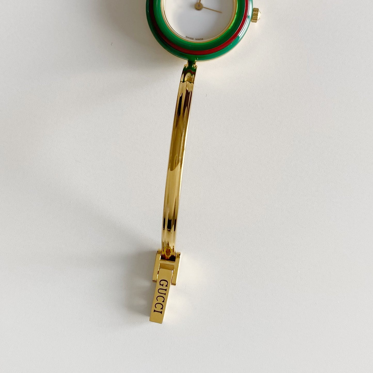 Gucci 1990s Interchangeable Bezel Gold Plated Bangle Watch with 12 bezels, case
