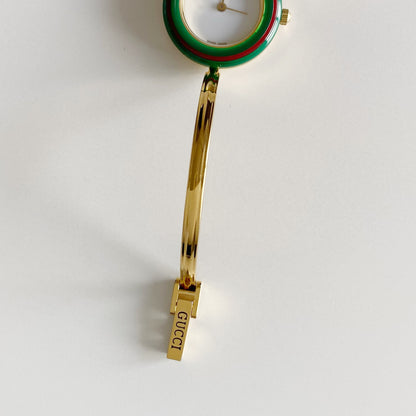 Gucci 1990s Interchangeable Bezel Gold Plated Bangle Watch with 12 bezels, case
