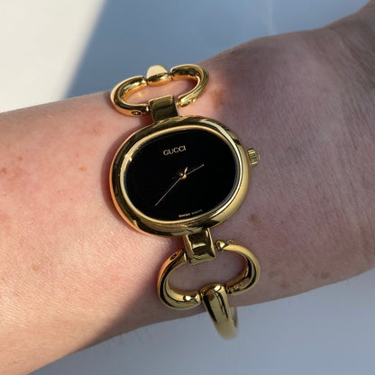Gucci 1990s Black Dial Gold Plated Bangle Watch