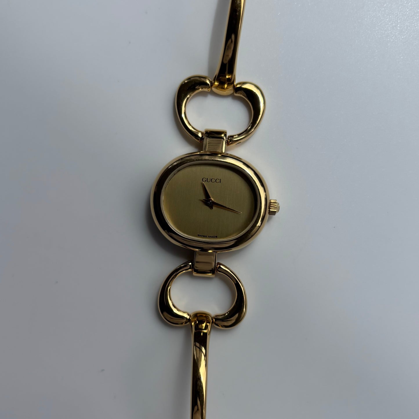 Gucci 1990s Oval Gold Dial Gold Plated Bangle Watch (Small)
