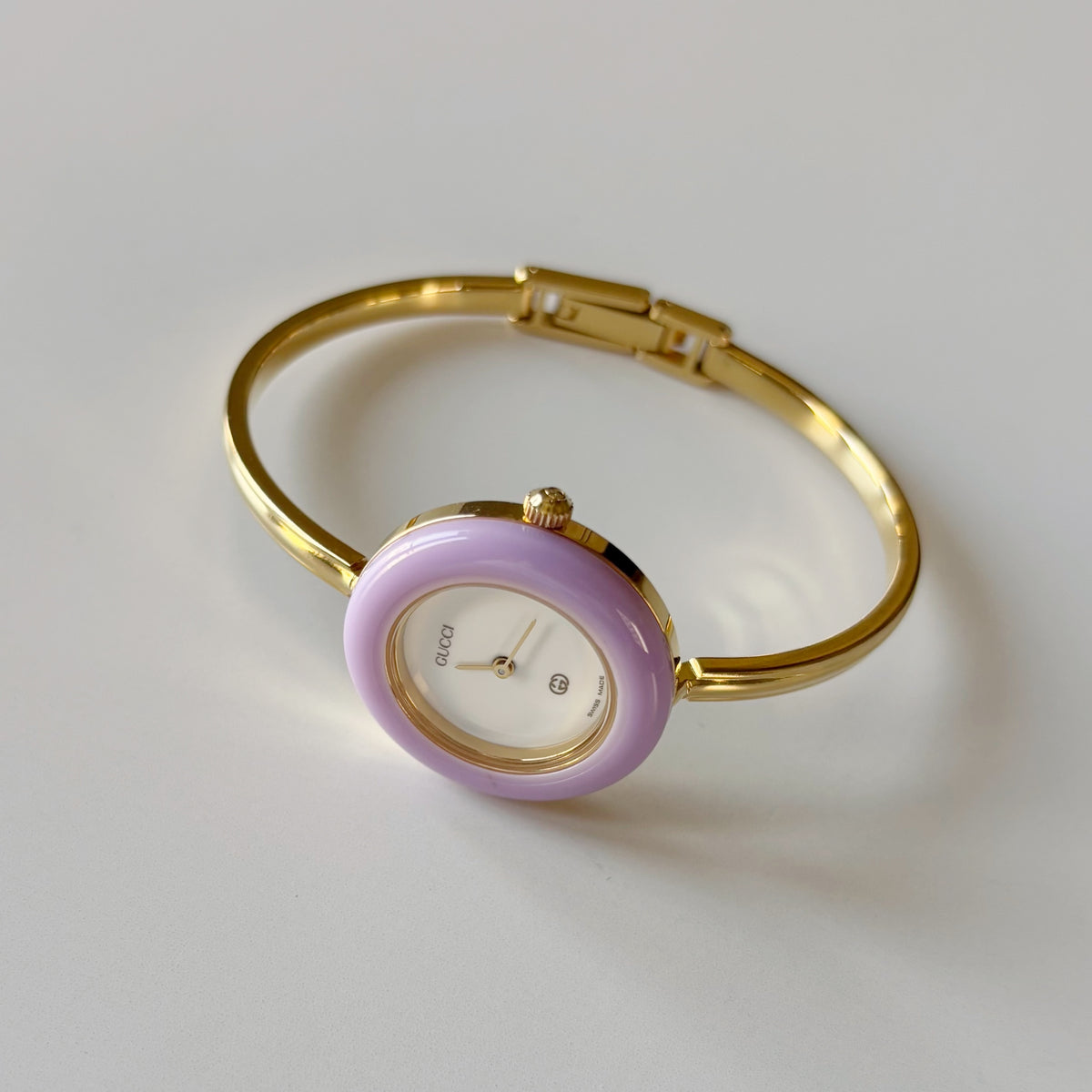 Gucci 1990s Interchangeable Bezel Gold Plated Bangle Watch with 12 bezels, case