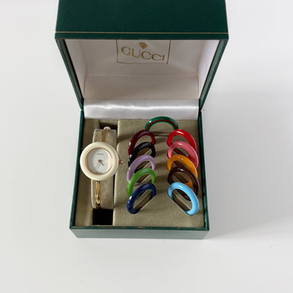 Gucci 1990s Interchangeable Bezel Gold Plated Bangle Watch with 12 bezels, case