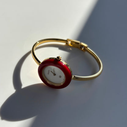 Gucci 1990s Interchangeable Bezel Gold Plated Bangle Watch with 12 bezels, case
