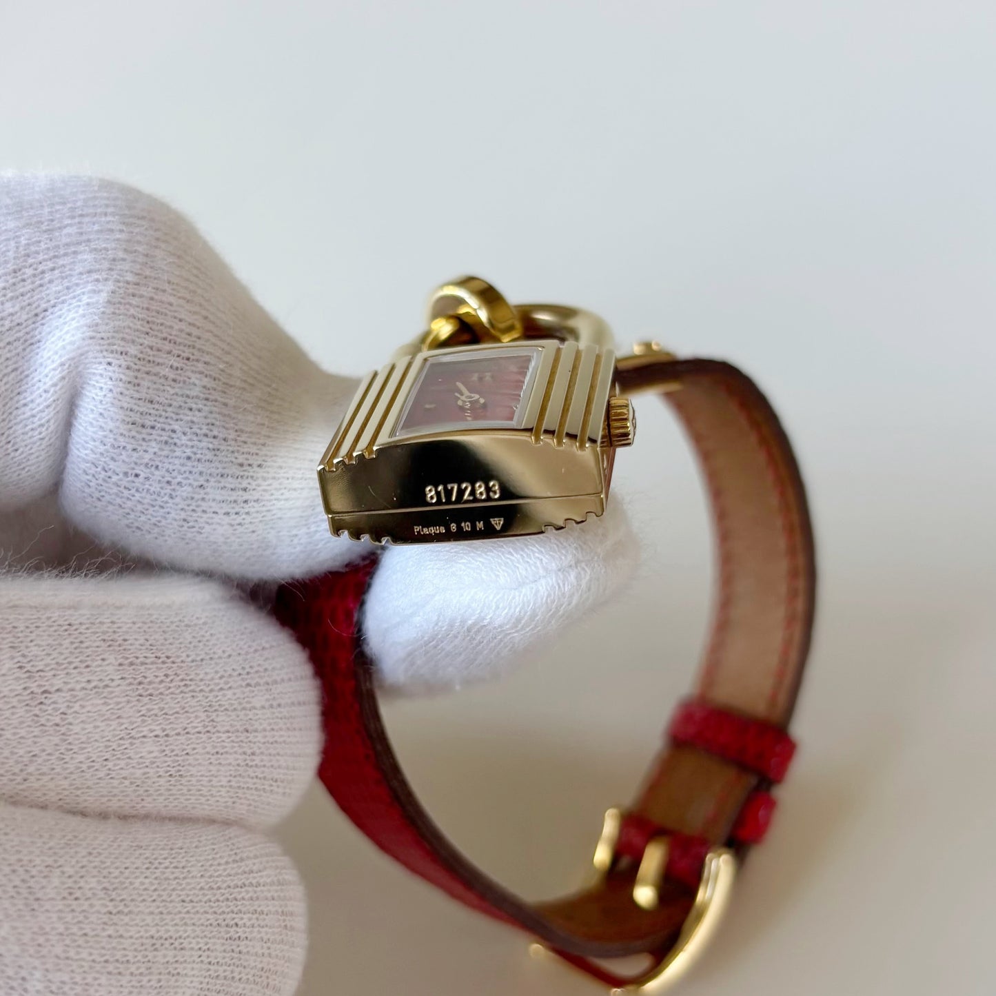 Hermes 1990s Kelly Red Dial Gold Plated Watch
