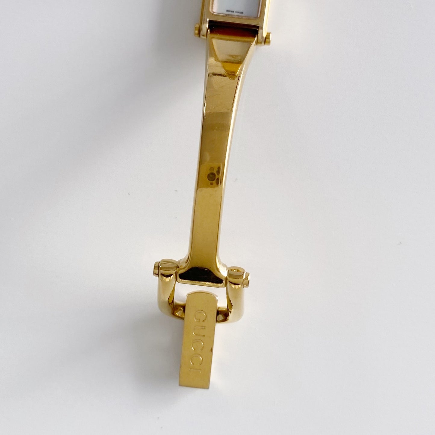 Gucci 1990s Seashell Dial Rectangular Gold Plated Bangle Watch