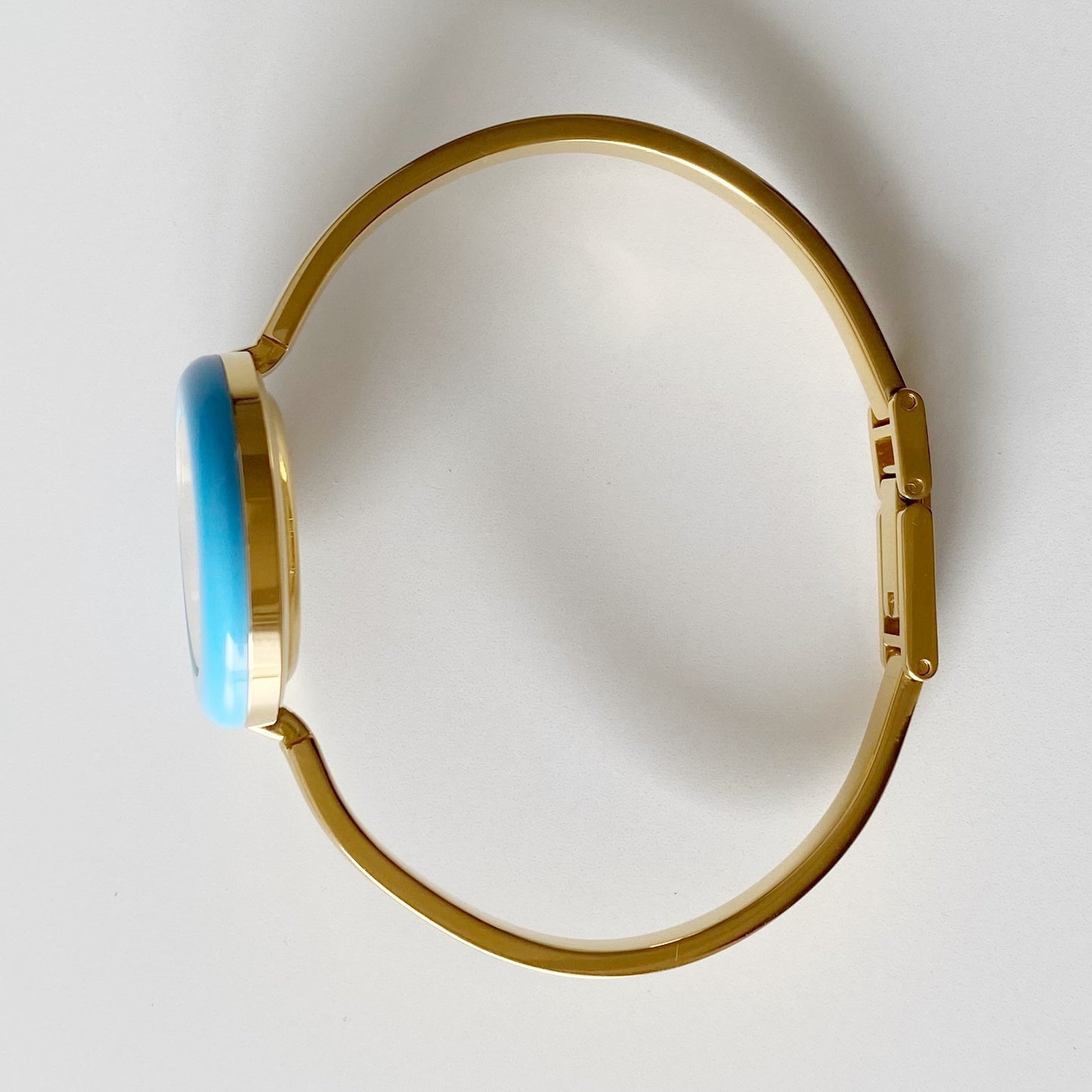 Gucci 1990s Interchangeable Bezel Gold Plated Bangle Watch with 12 bezels, case