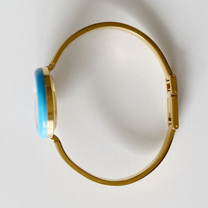Gucci 1990s Interchangeable Bezel Gold Plated Bangle Watch with 12 bezels, case