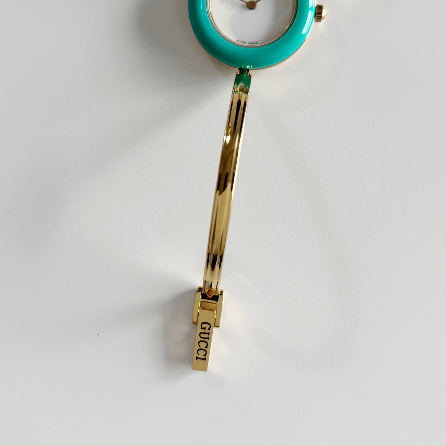Gucci 1990s Interchangeable Bezel Gold Plated Bangle Watch with 12 bezels, case