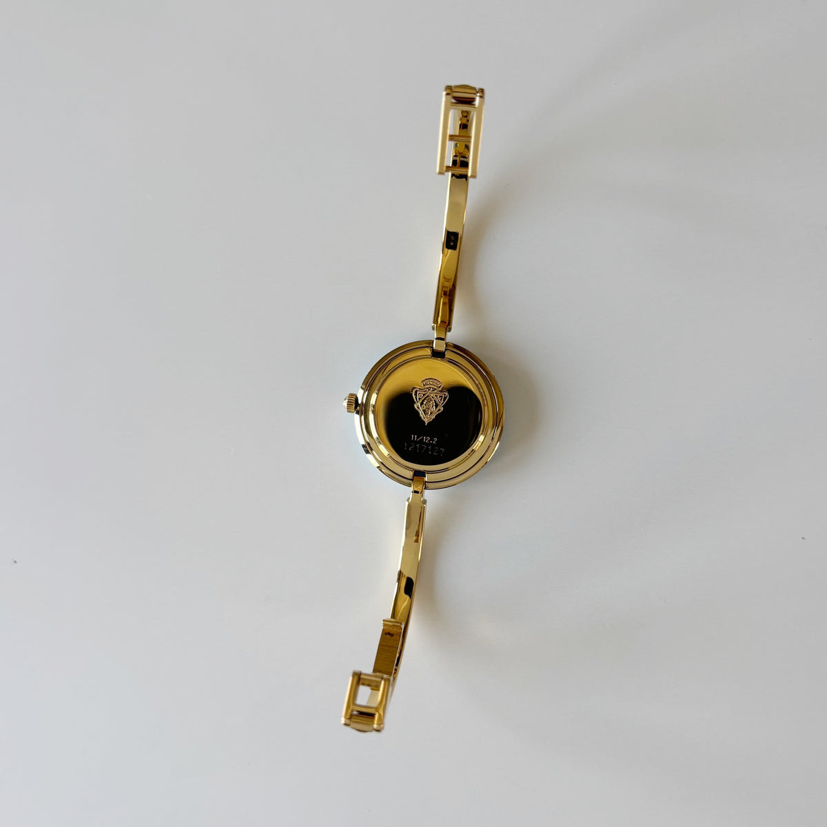 Gucci 1990s Interchangeable Bezel Gold Plated Bangle Watch with 12 bezels, case (Small)