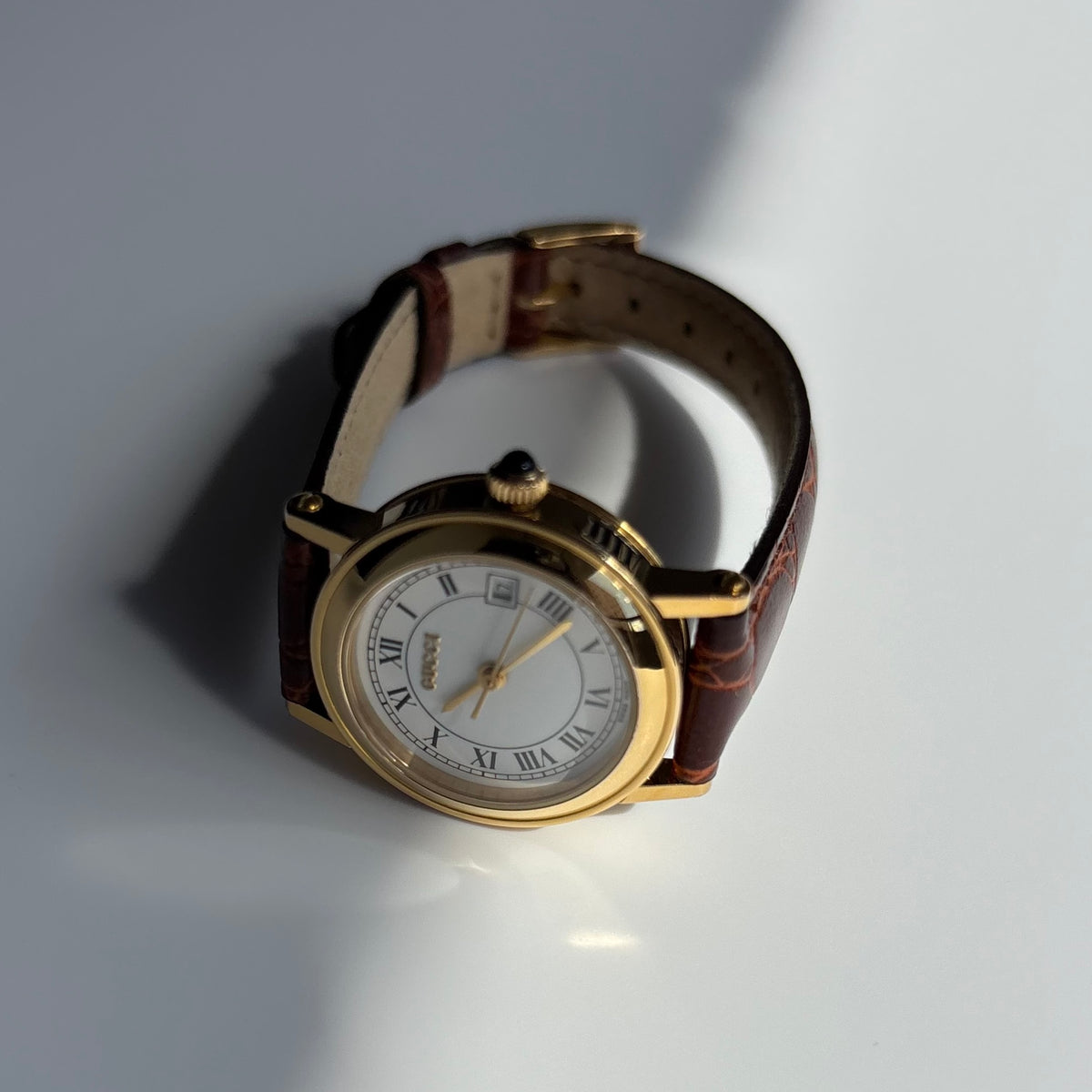 Gucci 1990s Date Round Dial Gold-Plated Watch