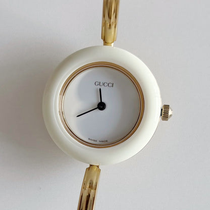 Gucci 1990s Interchangeable Bezel Gold Plated Bangle Watch with 12 bezels, case