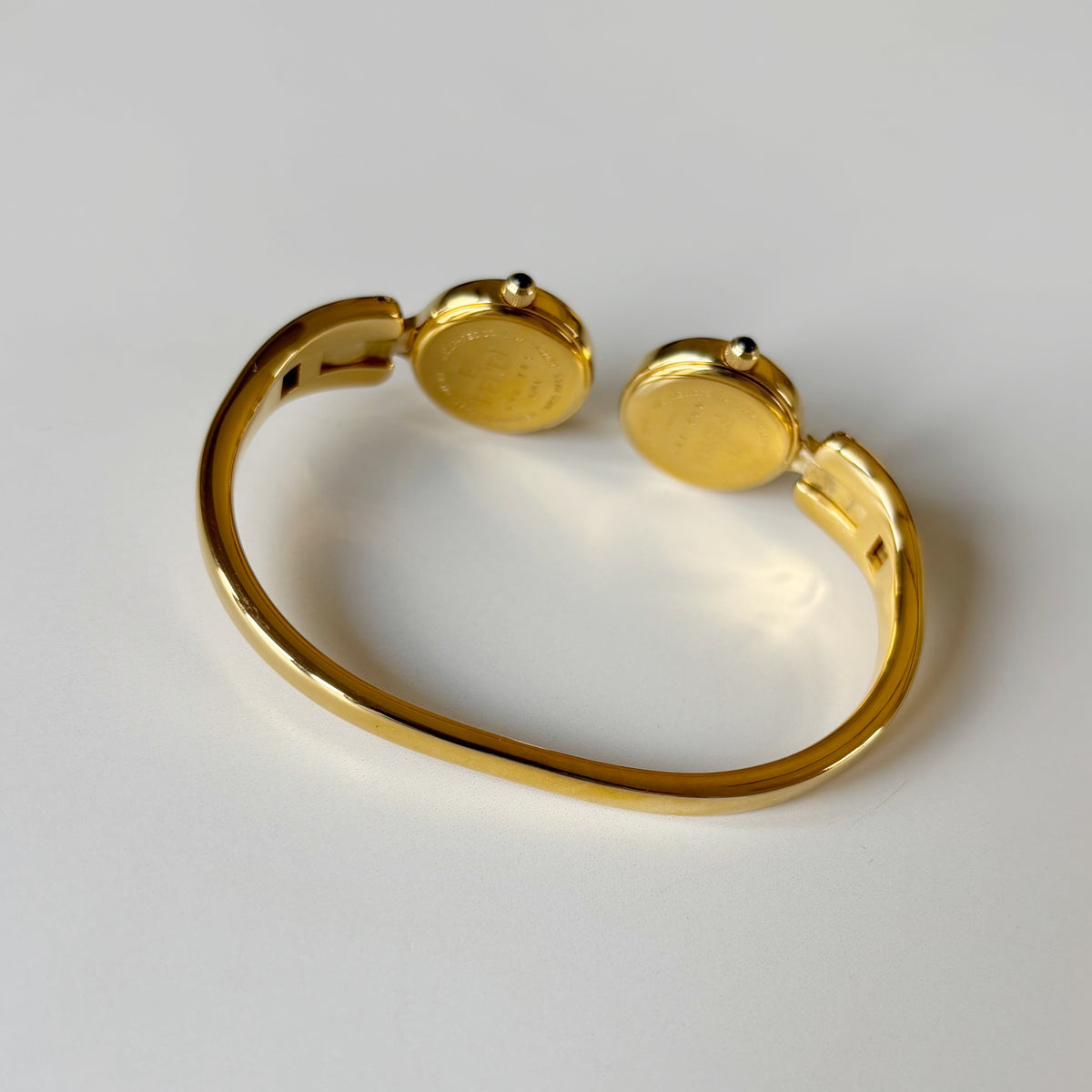 Fendi 1990s Seashell Dial Two Time Zone Gold Plated Bangle Watch
