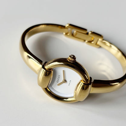 Gucci 1990s Round Dial Gold Plated Bangle Watch