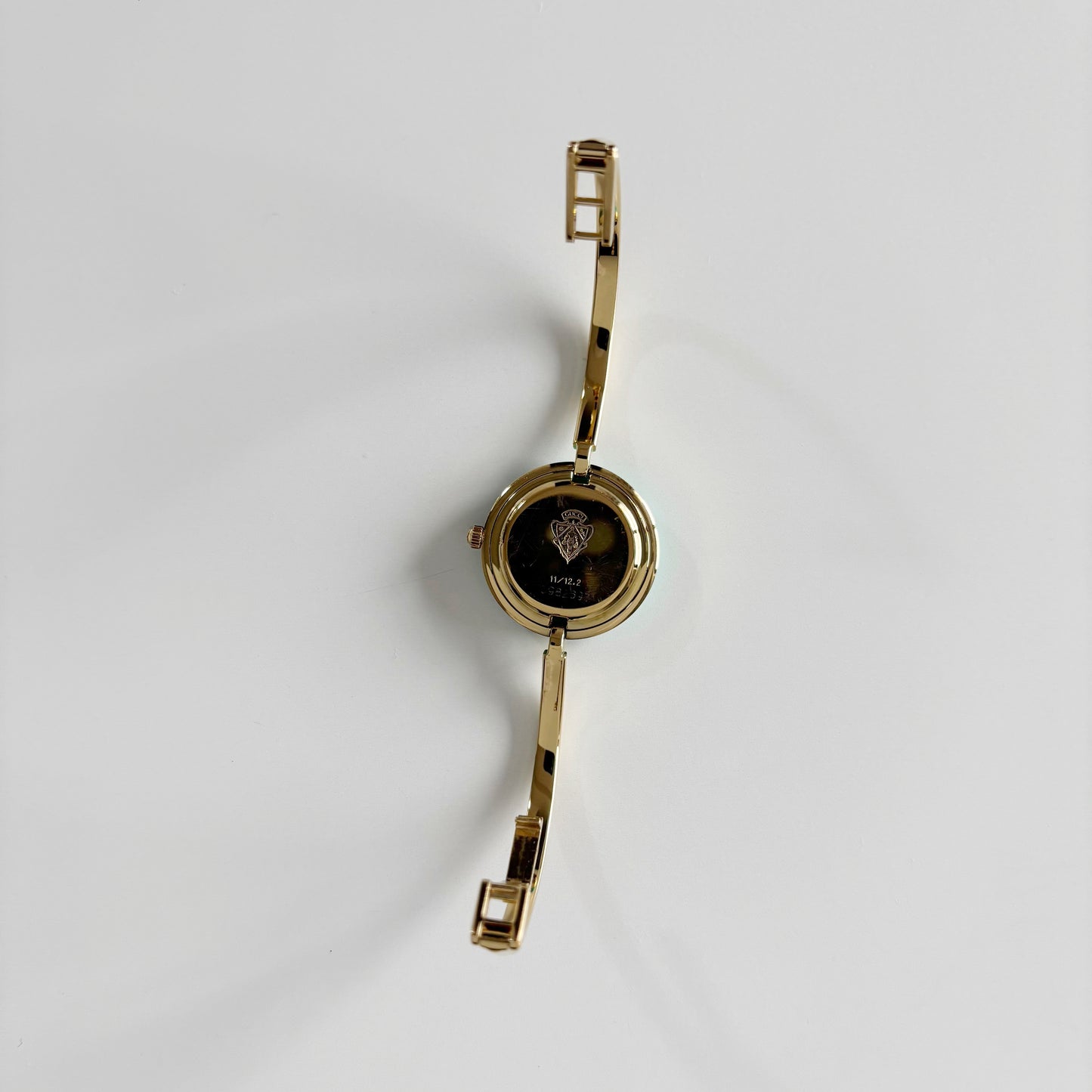 Gucci 1990s Interchangeable Bezel Gold Plated Bangle Watch with 12 bezels, case