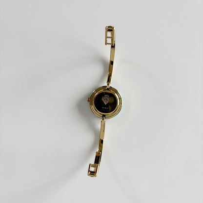 Gucci 1990s Interchangeable Bezel Gold Plated Bangle Watch with 12 bezels, case