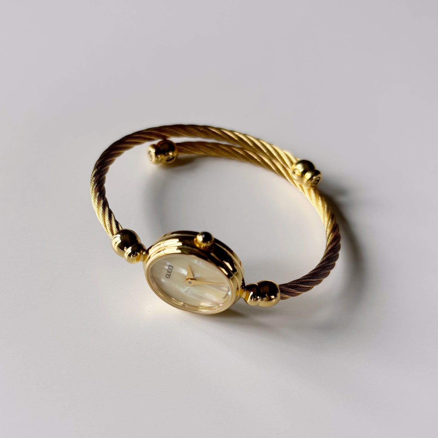 Gucci 1990s Seashell Dial Gold Plated Cable Bangle Watch