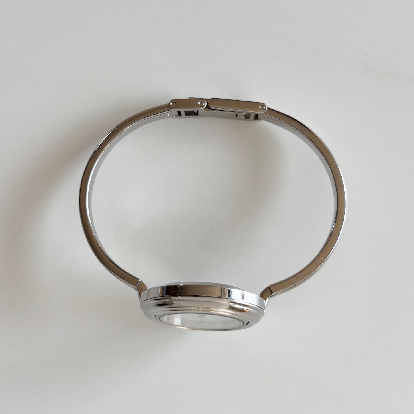 Gucci 1990s Interchangeable Bezel Stainless steel Bangle Watch with 12 bezels, case (Small)