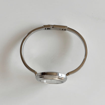 Gucci 1990s Interchangeable Bezel Stainless steel Bangle Watch with 12 bezels, case (Small)
