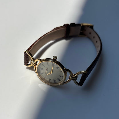 Gucci 1990s Round Cream Dial Horsebit Gold Plated Watch