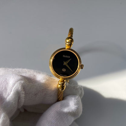 Gucci 1990s Black Dial Gold Plated Bangle Watch