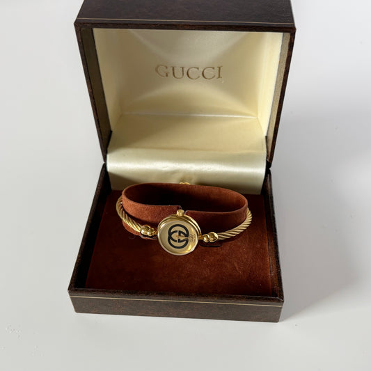 Gucci 1980s Round Dial Cable Band Bangle Watch